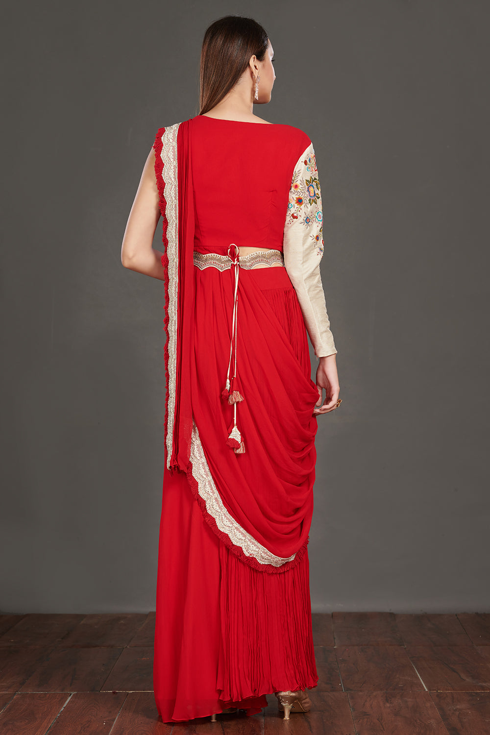  Buy stunning red pant saree online in USA with one sided embroidered jacket. Make a fashion statement on festive occasions and weddings with designer suits, Indian dresses, Anarkali suits, palazzo suits, designer gowns, sharara suits from Pure Elegance Indian fashion store in USA.-back