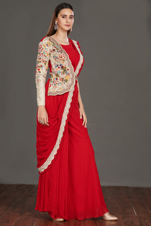  Buy stunning red pant saree online in USA with one sided embroidered jacket. Make a fashion statement on festive occasions and weddings with designer suits, Indian dresses, Anarkali suits, palazzo suits, designer gowns, sharara suits from Pure Elegance Indian fashion store in USA.-right