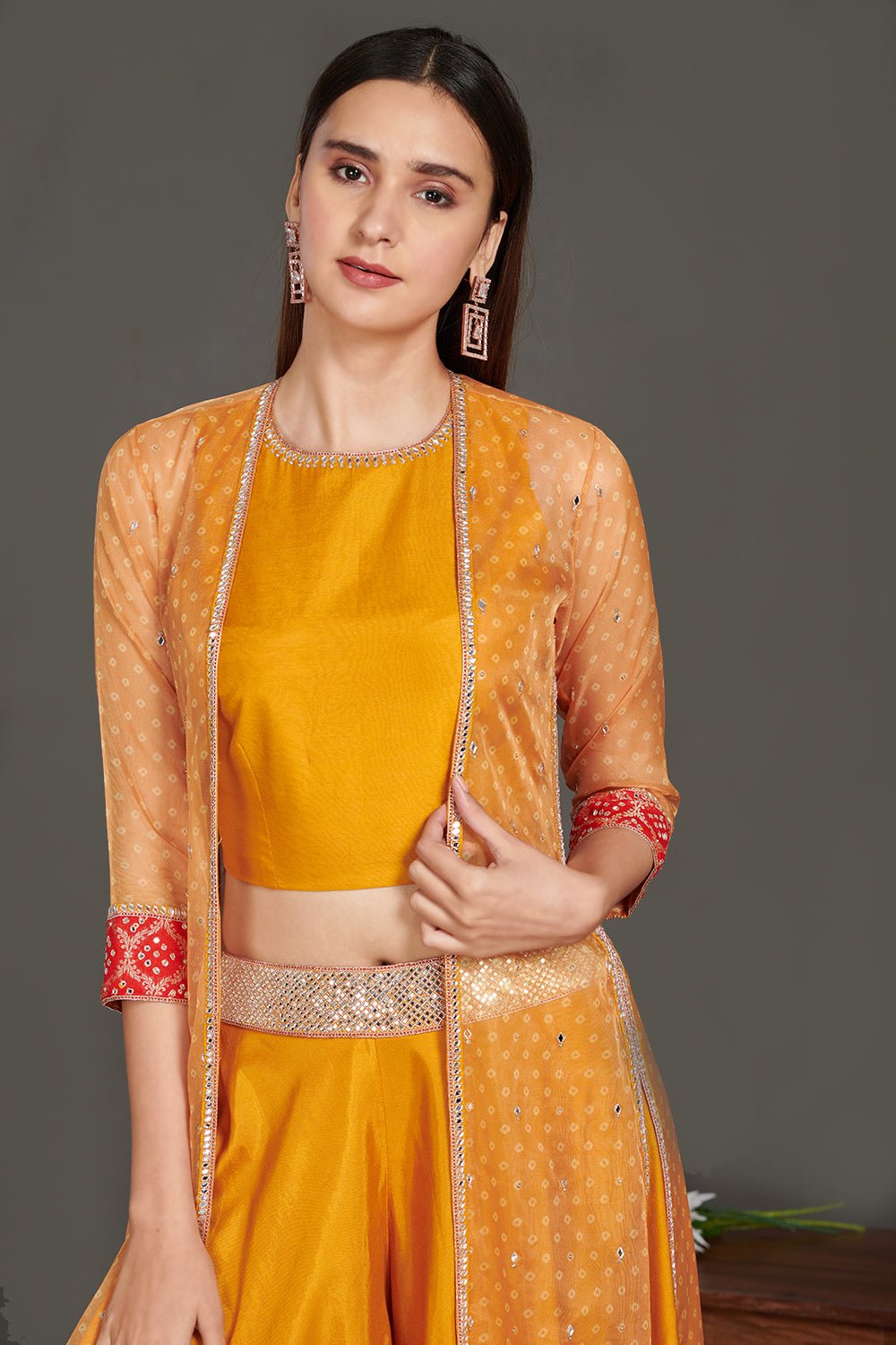 Shop stunning mustard three piece co-ord set online in USA.  Make a fashion statement on festive occasions and weddings with designer suits, Indian dresses, Anarkali suits, palazzo suits, designer gowns, sharara suits from Pure Elegance Indian fashion store in USA.-closeup