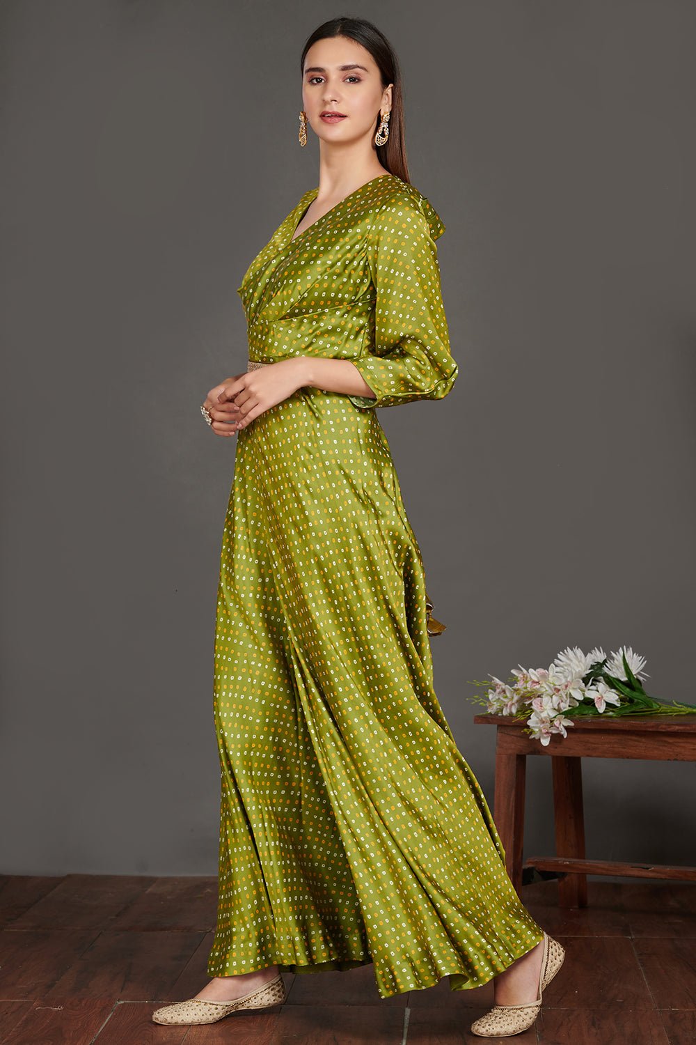 Shop beautiful mehendi green Bandhej print jumpsuit online in USA with belt. Make a fashion statement on festive occasions and weddings with palazzo suits, sharara suits, partywear dresses, salwar suits from Pure Elegance Indian fashion store in USA.-full view