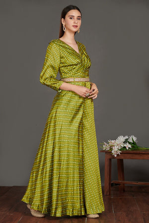 Shop beautiful mehendi green Bandhej print jumpsuit online in USA with belt. Make a fashion statement on festive occasions and weddings with palazzo suits, sharara suits, partywear dresses, salwar suits from Pure Elegance Indian fashion store in USA.-side