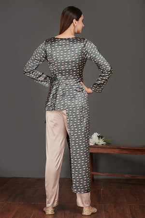 Buy stunning grey asymmetric printed satin tunic online in USA with beige pants. Make a fashion statement on festive occasions and weddings with palazzo suits, sharara suits, partywear dresses, salwar suits from Pure Elegance Indian fashion store in USA.-back