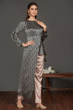 Buy stunning grey asymmetric printed satin tunic online in USA with beige pants. Make a fashion statement on festive occasions and weddings with palazzo suits, sharara suits, partywear dresses, salwar suits from Pure Elegance Indian fashion store in USA.-right