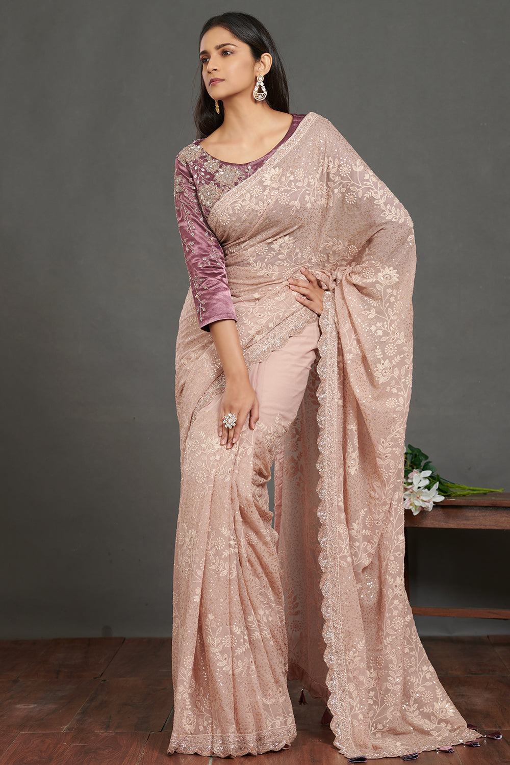 Buy stunning dusty pink chikankari saree online in USA with purple saree blouse. Make a fashion statement on festive occasions and weddings with designer sarees, embroidered saris, handwoven saris, party wear sarees from Pure Elegance Indian fashion store in USA.-pallu