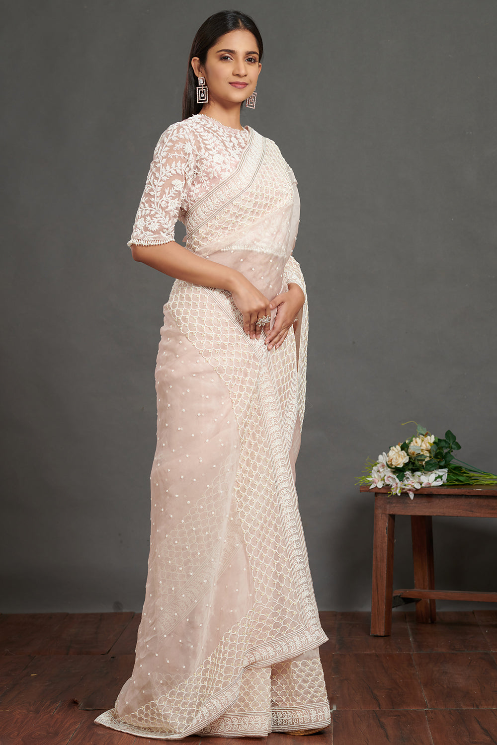 Shop gorgeous light pink lace saree online in USA with self-work saree blouse. Make a fashion statement on festive occasions and weddings with designer sarees, embroidered saris, handwoven saris, party wear sarees from Pure Elegance Indian fashion store in USA.-right