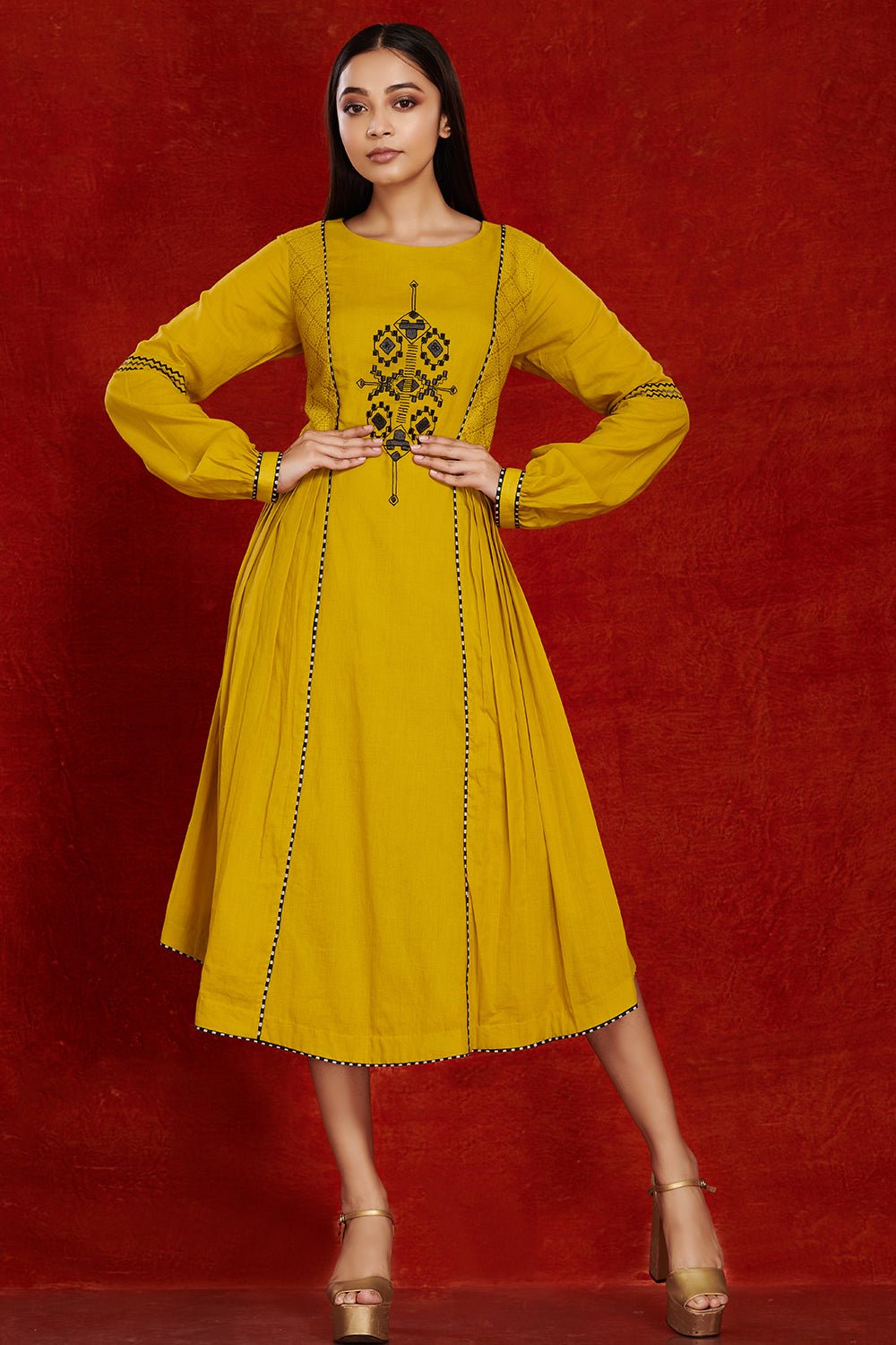 Shop stunning mustard side pleated cotton midi dress online in USA. Make a fashion statement on festive occasions and weddings with palazzo suits, sharara suits, partywear dresses, salwar suits from Pure Elegance Indian fashion store in USA.-full view