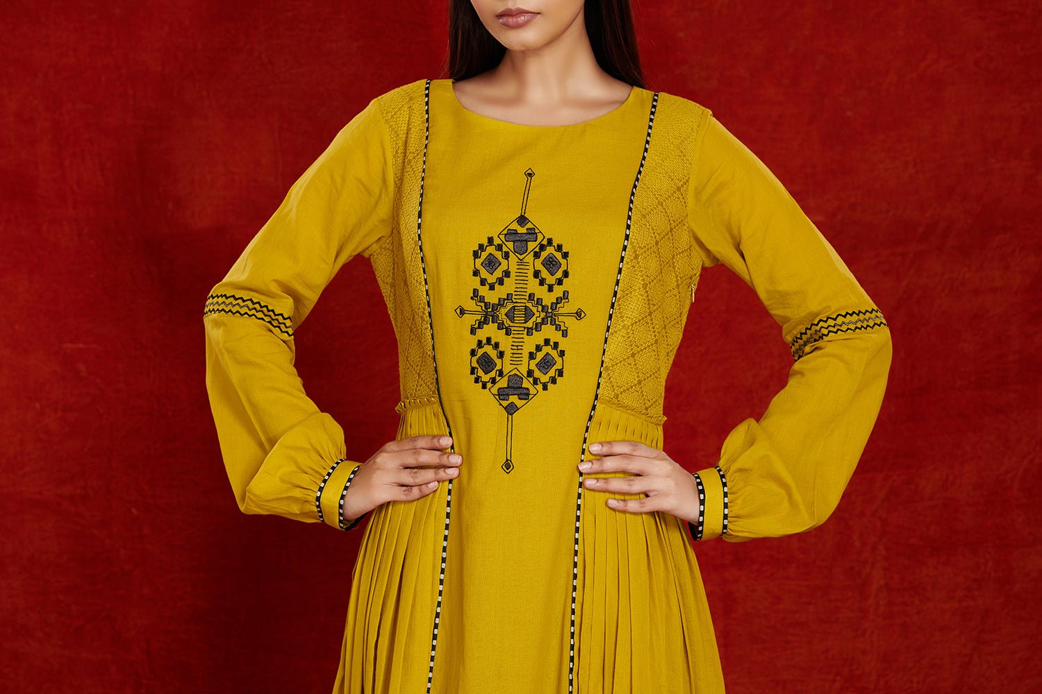 Shop stunning mustard side pleated cotton midi dress online in USA. Make a fashion statement on festive occasions and weddings with palazzo suits, sharara suits, partywear dresses, salwar suits from Pure Elegance Indian fashion store in USA.-embroidery