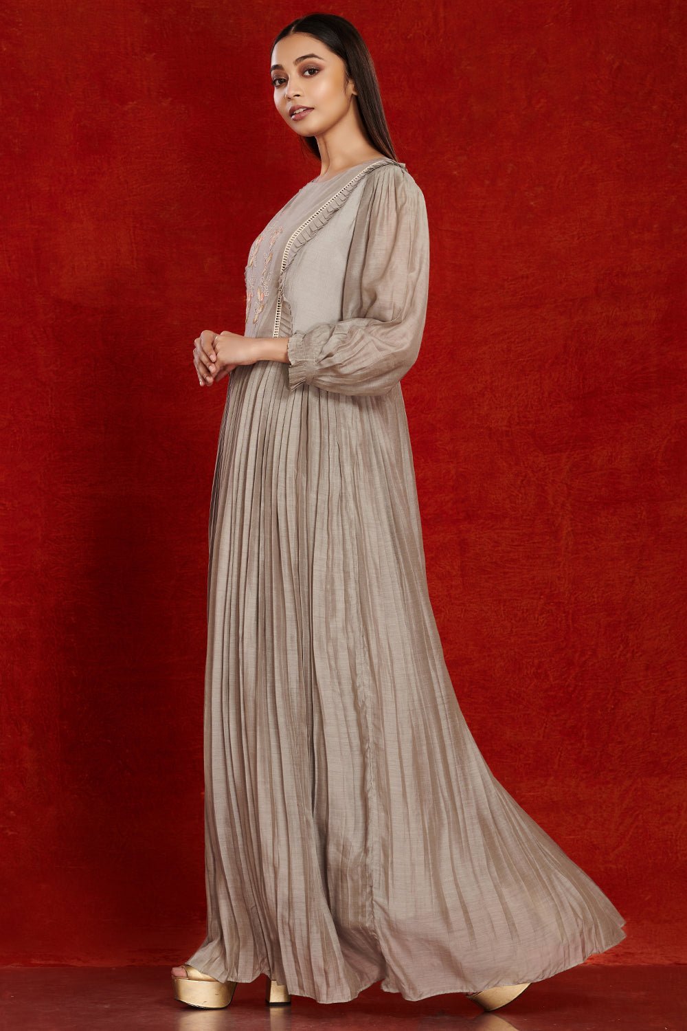 Buy stunning grey balloon sleeves muslin gown online in USA with pastel embroidery. Make a fashion statement on festive occasions and weddings with palazzo suits, sharara suits, partywear dresses, salwar suits from Pure Elegance Indian fashion store in USA.-full view