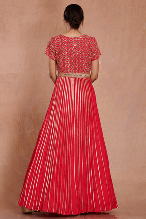 Shop stunning red fit and flare mirror work gown online in USA. Make a fashion statement on festive occasions and weddings with designer suits, Indian dresses, Anarkali suits, palazzo suits, designer gowns, sharara suits from Pure Elegance Indian fashion store in USA.-back