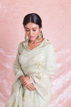 Shop stunning mint green embroidered organza saree online in USA with matching embroidered saree blouse. Champion ethnic fashion on weddings and festivals with a stunning collection of designer sarees, handloom saris with blouse, wedding sarees, from Pure Elegance Indian fashion store in USA.-closeup