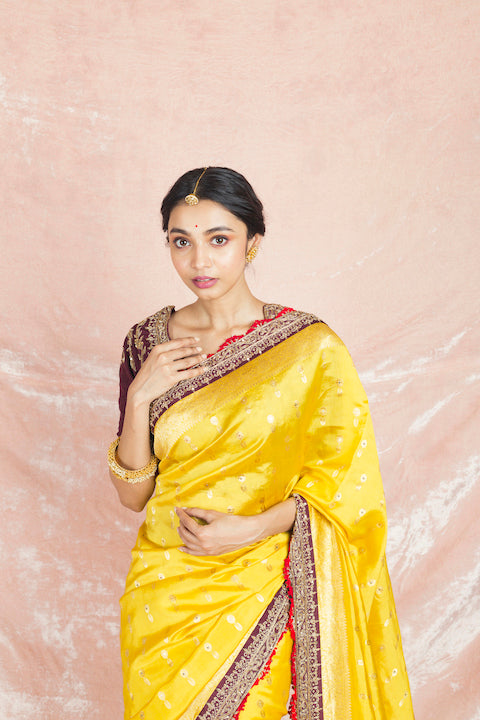 Shop stunning yellow embroidered handloom sari online in USA with brown embroidered saree blouse. Champion ethnic fashion on weddings and festivals with a stunning collection of designer sarees, handloom sarees with blouse, wedding sarees, from Pure Elegance Indian fashion store in USA.-closeup