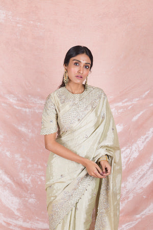 Buy beautiful cream embroidered handloom saree online in USA with matching embroidered sari blouse. Champion ethnic fashion on weddings and festivals with a stunning collection of designer sarees, handloom saris with blouse, wedding sarees, from Pure Elegance Indian fashion store in USA.-closeup