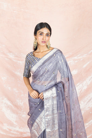 Shop gorgeous grey mirror work handloom saree online in USA with embroidered sari blouse. Champion ethnic fashion on weddings and festivals with a stunning collection of Banarasi sarees, handloom sarees with blouse, bridal sarees, from Pure Elegance Indian fashion store in USA.-closeup