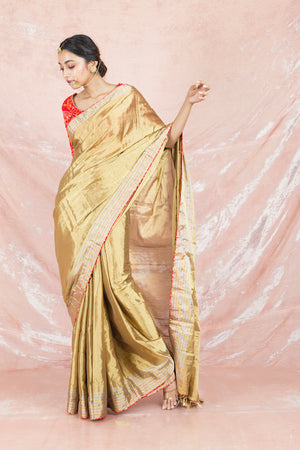 Shop gorgeous golden handloom saree online in USA with red bandhej saree blouse. Champion ethnic fashion on weddings and festivals with a stunning collection of Banarasi sarees, handloom sarees with blouse, bridal sarees, from Pure Elegance Indian fashion store in USA.-side