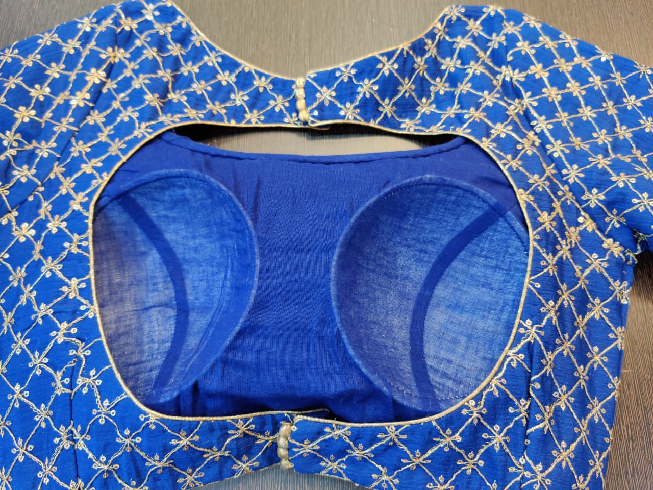 Buy stunning blue embroidered readymade saree blouse online in USA. Elevate your ethnic sari style with a stunning collection of designer sari blouses, embroidered saree blouses, Banarasi sari blouse, fancy saree blouse from Pure Elegance Indian clothing store in USA.-back