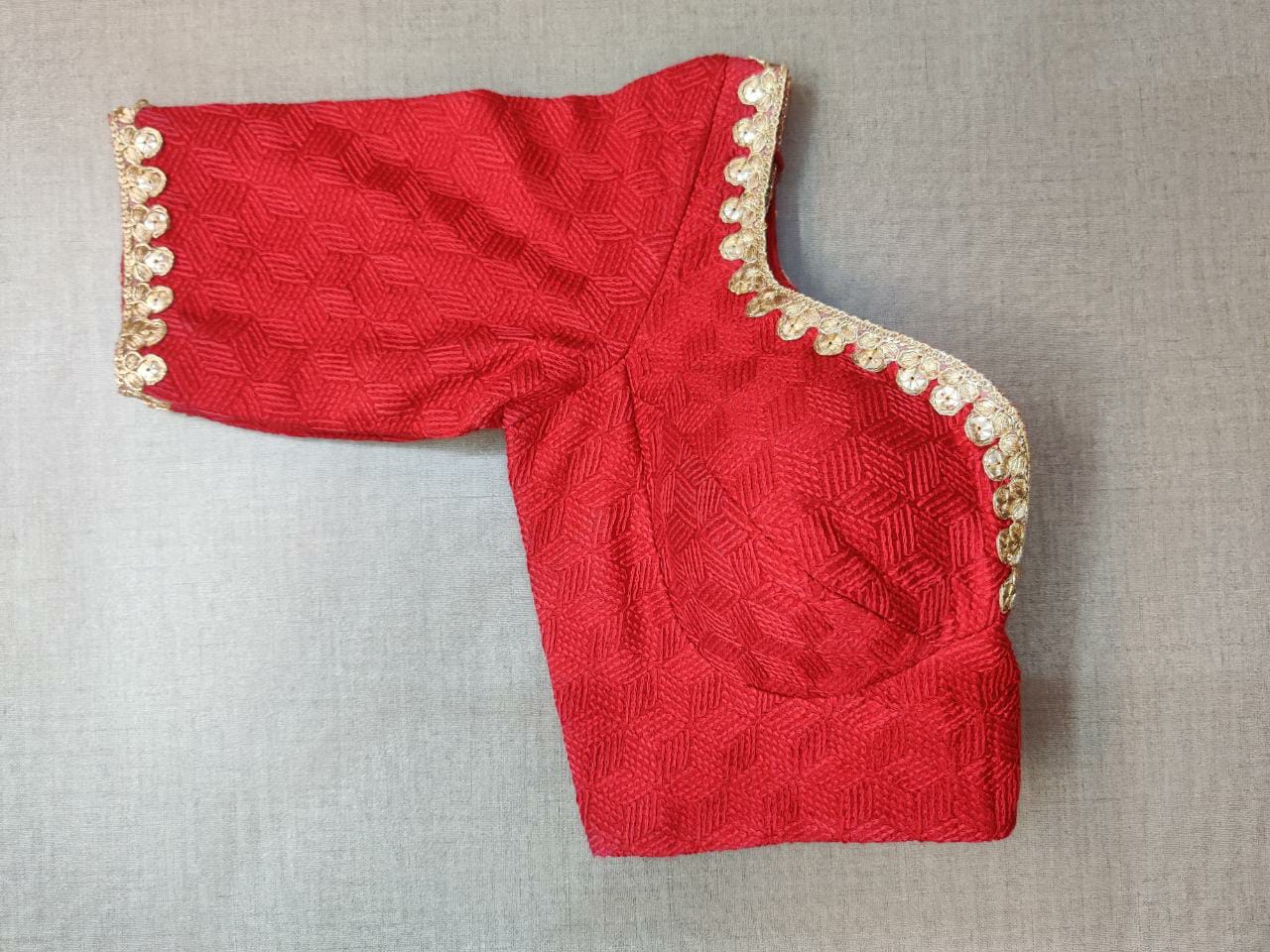Shop beautiful red self-embroidery sari blouse online in USA with golden lace. Elevate your Indian ethnic saree looks with beautiful readymade saree blouse, embroidered saree blouses, Banarasi saree blouse, designer sari blouses, sleeveless saree blouses from Pure Elegance Indian fashion store in USA.-sleeves