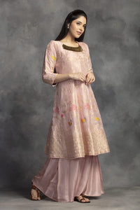 Shop beautiful powder pink Banarasi silk suit online in USA with palazzo. Make a fashion statement on festive occasions with palazzo suits, sharara suits, partywear dresses, salwar suits from Pure Elegance Indian fashion store in USA.-front