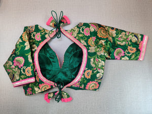 Buy gorgeous dark green embroidered neckline Banarasi sari blouse online in USA. Elevate your Indian ethnic saree looks with beautiful readymade saree blouse, embroidered sari blouses, Banarasi saree blouse, designer sari from Pure Elegance Indian fashion store in USA.-back