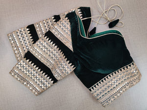 Buy stunning green velvet designer saree blouse online in USA with embroidered border. Elevate your Indian ethnic saree looks with beautiful readymade saree blouse, embroidered saree blouses, Banarasi saree blouse, designer sari blouses from Pure Elegance Indian fashion store in USA.-sleeves