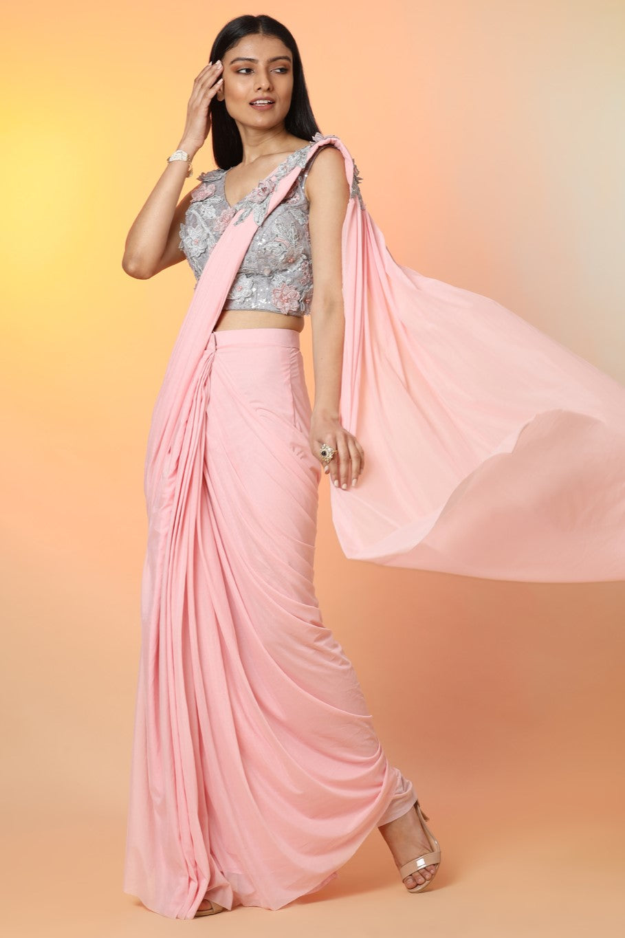 Buy stunning powder pink embroidered crepe ready-to-wear sari online in USA with blouse. Radiate glamor on special occasions in exquisite designer sarees, embroidered sarees, partywear saris, Bollywood sarees, fancy sarees from from Pure Elegance Indian saree store in USA.-full view