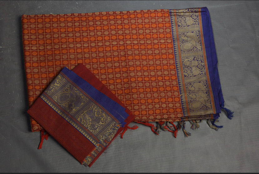 Buy beautiful dark red Kanchipuram cotton saree online in USA with blue zari border. Flaunt your ethnic style on special occasions with latest designer sarees, pure silk sarees, handwoven sarees, Kanchipuram silk sarees, embroidered sarees, georgette sarees from Pure Elegance Indian saree store in USA.-blouse