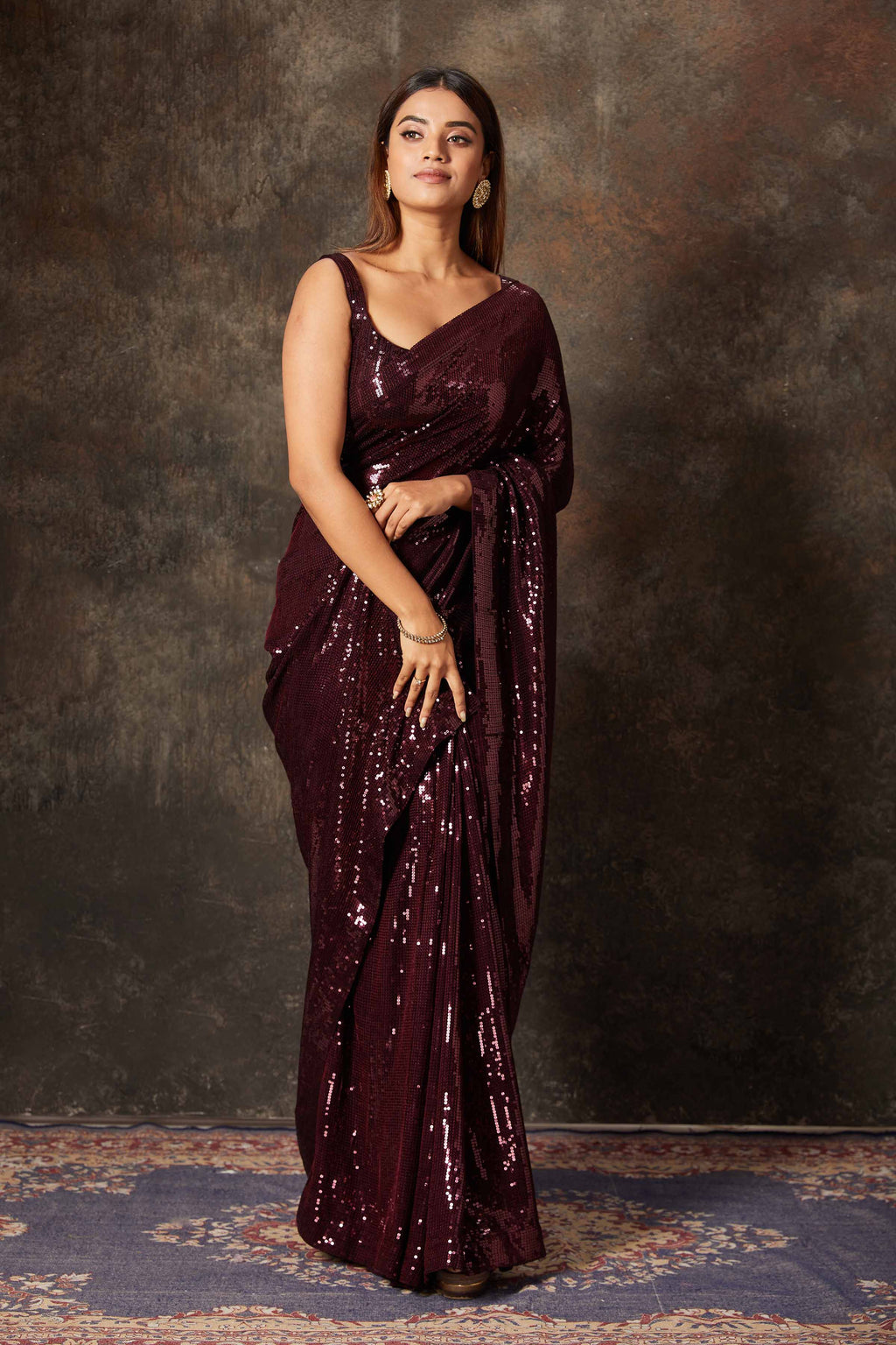Buy beautiful wine color georgette saree online in USA with blouse. Flaunt your Indian style on special occasions in beautiful designer sarees, embroidered sarees, Bollywood sarees, partywear sarees, wedding sarees from Pure Elegance Indian saree store in USA. -full view