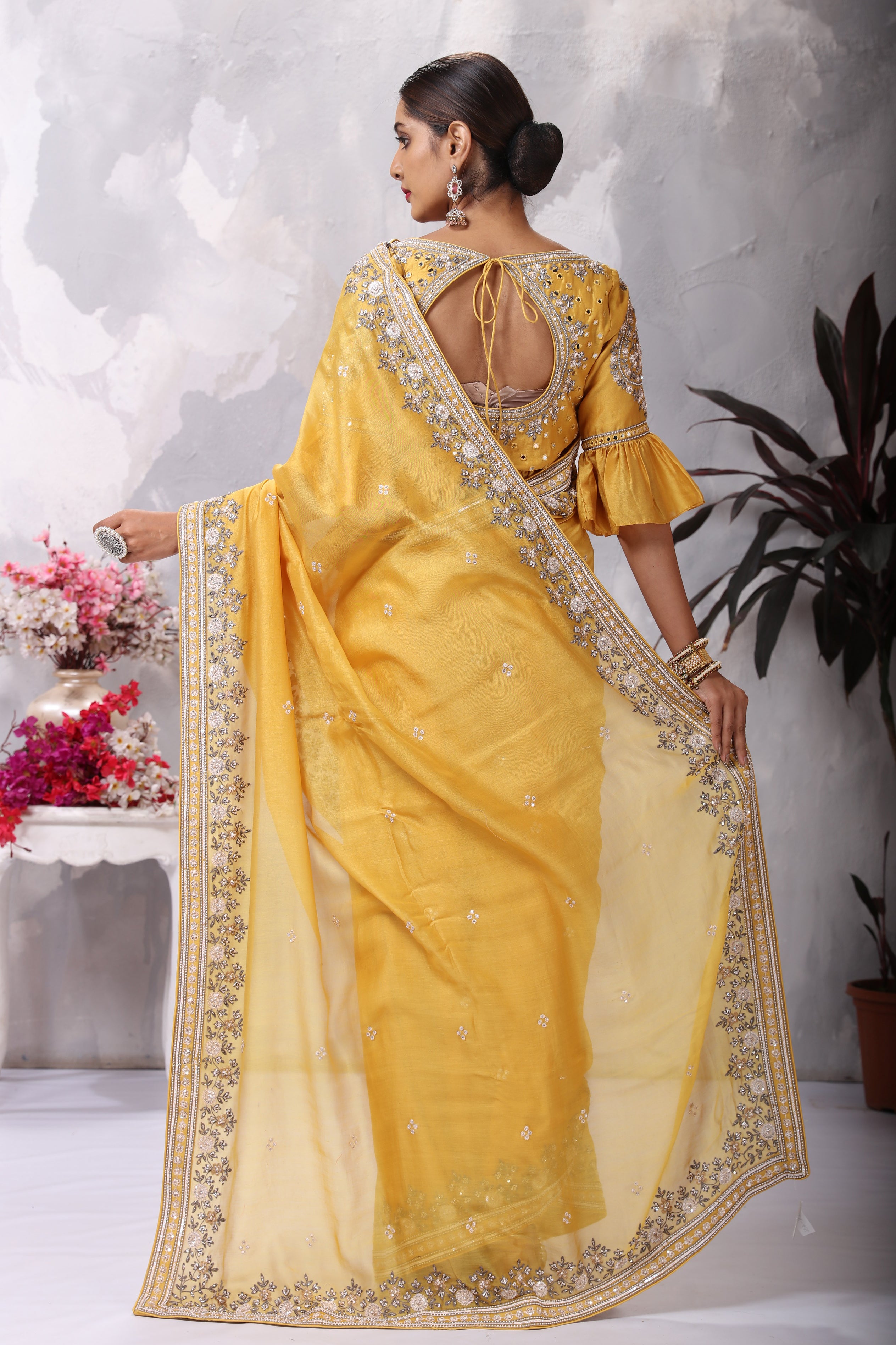 Buy mustard yellow saree online in USA with embroidered border and matching blouse. Flaunt Indian style at parties and weddings in beautiful designer sarees, embroidered sarees, silk sarees, handloom sarees from Pure Elegance Indian fashion store in USA.-back