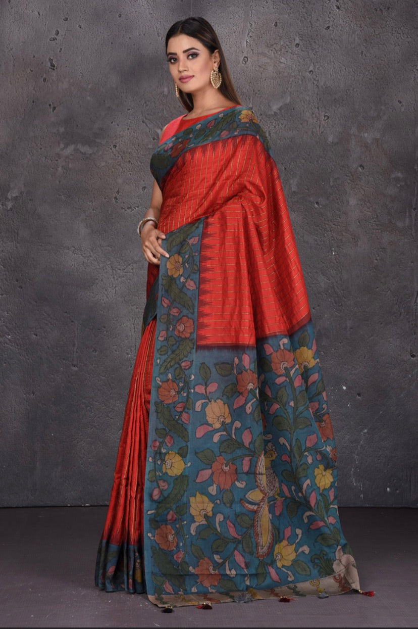 Shop stunning red silk sari online in USA with Kalamkari print pallu. Keep your ethnic wardrobe up to date with latest designer sarees, pure silk sarees, handwoven sarees, tussar silk sarees, embroidered sarees, printed sarees from Pure Elegance Indian saree store in USA.-full view