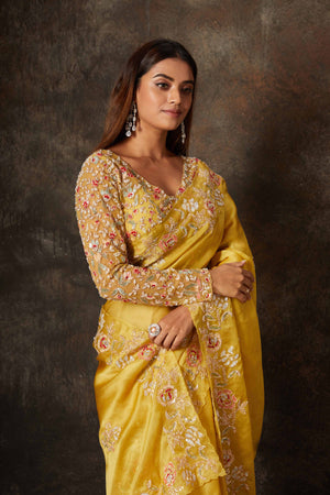 Buy beautiful mango yellow hand embroidered organza saree online in USA with blouse. Flaunt your Indian style on special occasions in beautiful designer sarees, embroidered sarees, Bollywood sarees, partywear sarees, wedding sarees from Pure Elegance Indian saree store in USA. -closeup