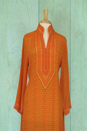501110 Pretty Orange Suit With A Bold Brown Duppatta