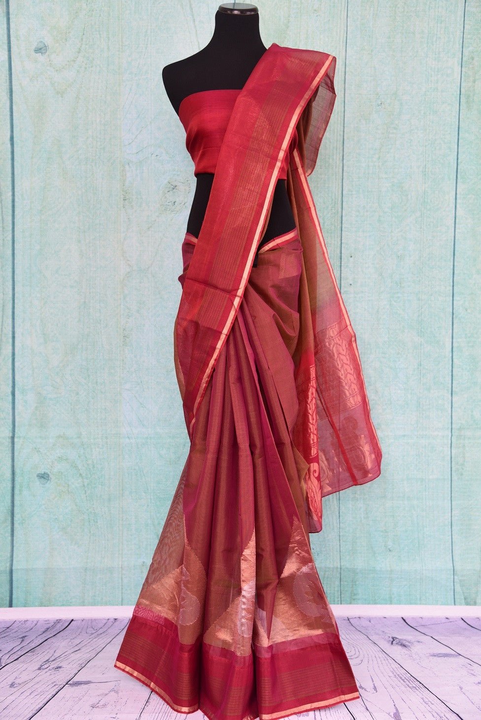 90C258 Traditional south silk saree available online in USA. The maroon and gold saree comes with paisley design and is great for festive occasions and pujas. This lovely saree is sure to be a versatile hit in your ethnic wear wardrobe.
