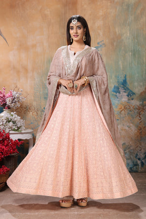 Buy beautiful peach embroidered Anarkali suit online in USA with beige dupatta. Flaunt Indian style at parties and weddings in beautiful designer dresses, salwar suits, Anarkali suits, gowns, palazzo suits from Pure Elegance Indian fashion store in USA.-flare