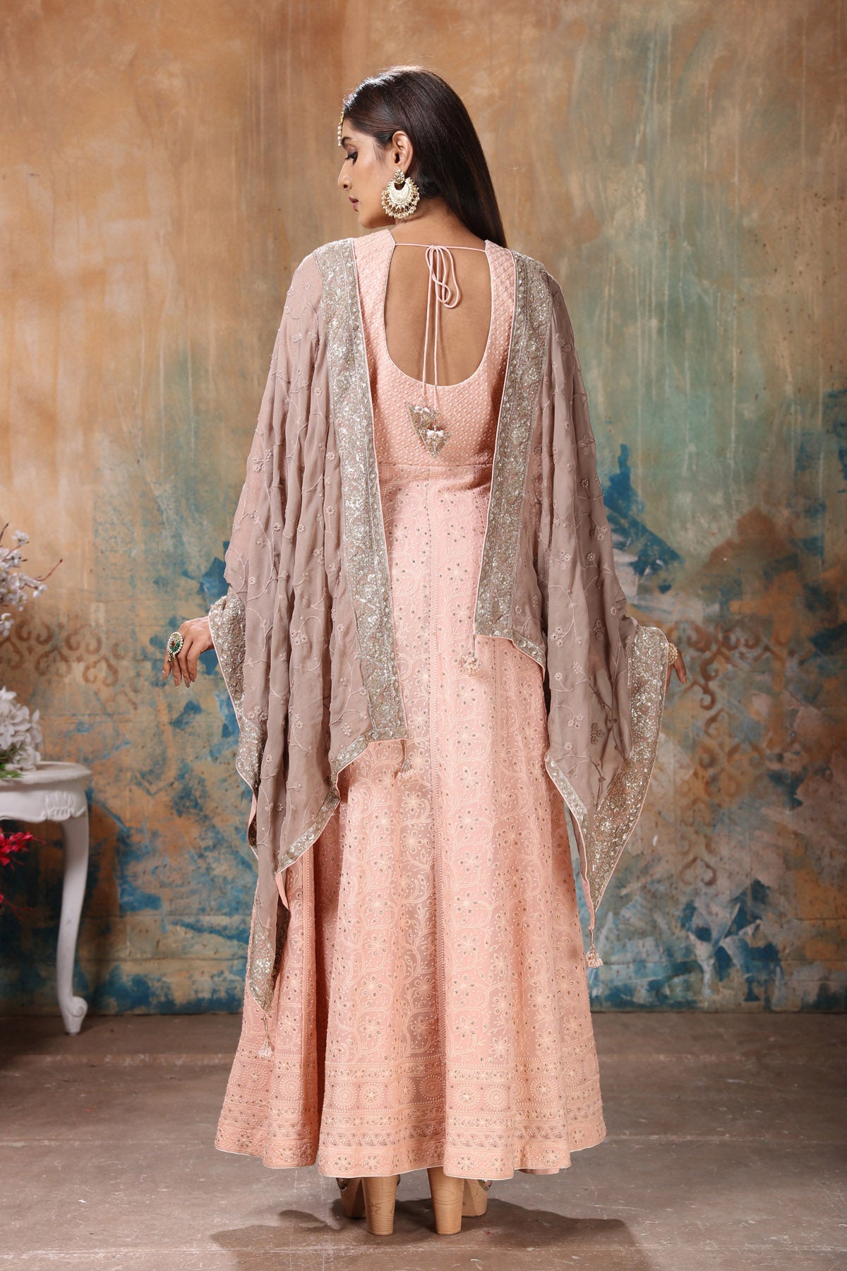 Buy beautiful peach embroidered Anarkali suit online in USA with beige dupatta. Flaunt Indian style at parties and weddings in beautiful designer dresses, salwar suits, Anarkali suits, gowns, palazzo suits from Pure Elegance Indian fashion store in USA.-back