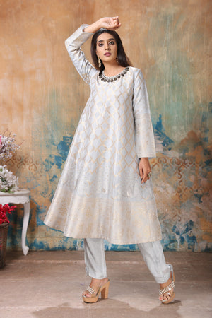 Buy stunning powder blue embroidered silk Banarasi suit online in USA with pants. Flaunt Indian style at parties and weddings in beautiful designer dresses, salwar suits, Anarkali suits, gowns, palazzo suits from Pure Elegance Indian fashion store in USA.-kurta