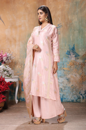 Buy gorgeous powder pink embroidered palazzo suit online in USA with dupatta. Flaunt Indian style at parties and weddings in beautiful designer dresses, salwar suits, Anarkali suits, gowns, palazzo suits from Pure Elegance Indian fashion store in USA.-left