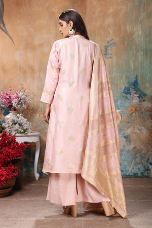 Buy gorgeous powder pink embroidered palazzo suit online in USA with dupatta. Flaunt Indian style at parties and weddings in beautiful designer dresses, salwar suits, Anarkali suits, gowns, palazzo suits from Pure Elegance Indian fashion store in USA.-back