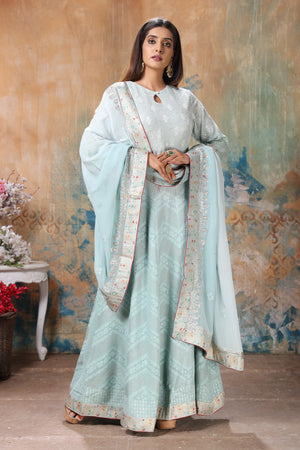 Shop stunning powder blue embroidered Anarkali suit online in USA with dupatta. Flaunt Indian style at parties and weddings in beautiful designer dresses, salwar suits, Anarkali suits, gowns, palazzo suits from Pure Elegance Indian fashion store in USA.-front