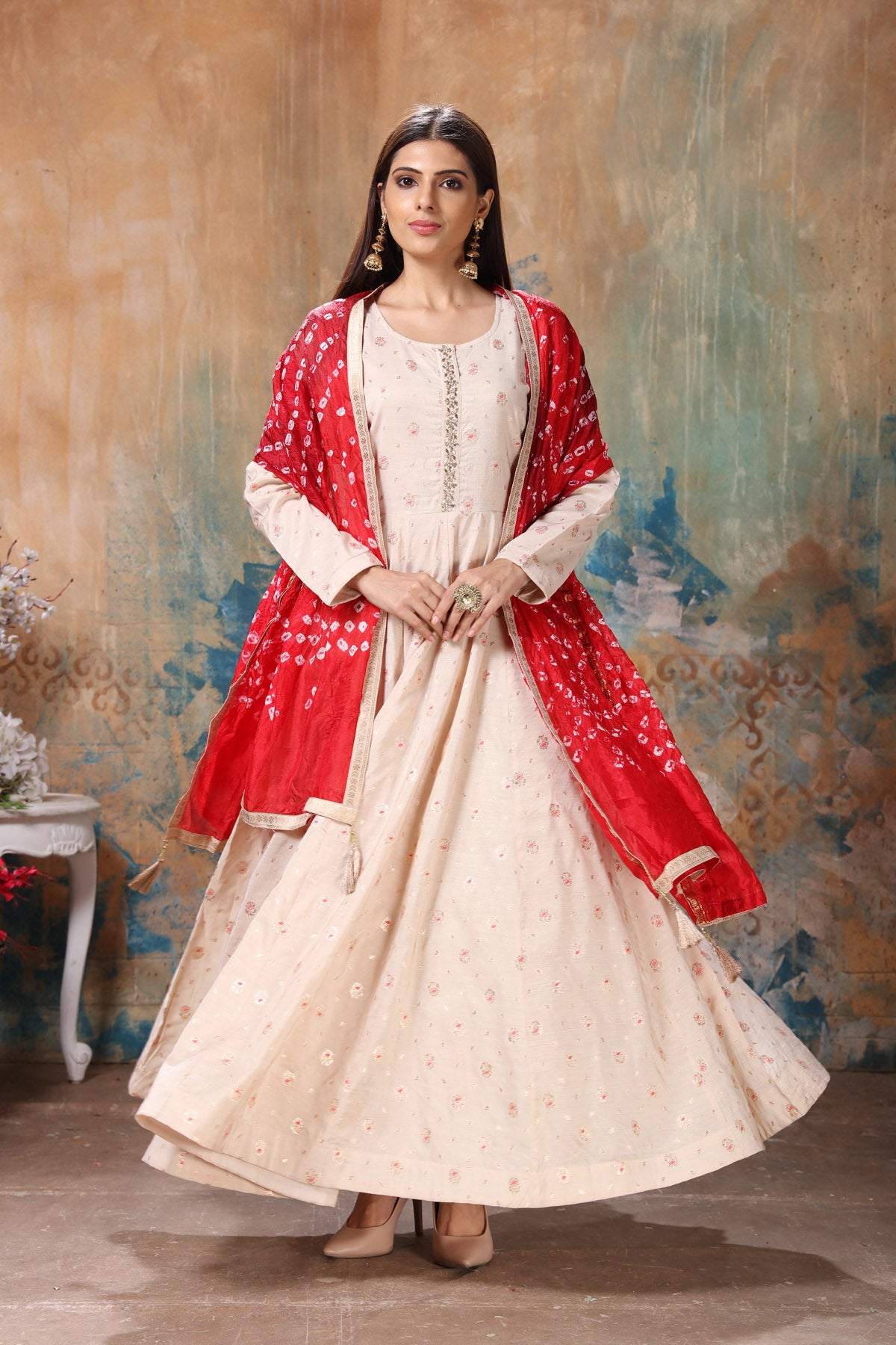 Shop beautiful cream embroidered Anarkali suit online in USA with red dupatta. Flaunt Indian style at parties and weddings in beautiful designer dresses, salwar suits, Anarkali suits, gowns, palazzo suits from Pure Elegance Indian fashion store in USA.-front