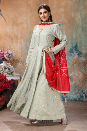 Buy stunning light grey embroidered Anarkali suit online in USA with red bandhej dupatta. Flaunt Indian style at parties and weddings in beautiful designer dresses, salwar suits, Anarkali suits, gowns, palazzo suits from Pure Elegance Indian fashion store in USA.-side