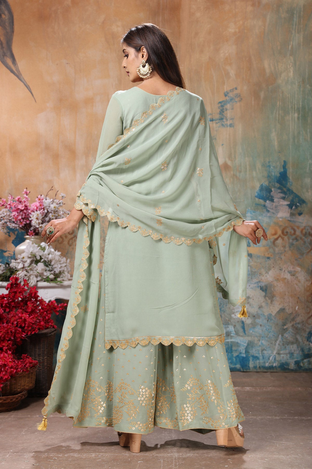 Shop beautiful mint green embroidered sharara suit online in USA with dupatta. Flaunt Indian style at parties and weddings in beautiful designer dresses, salwar suits, Anarkali suits, gowns, palazzo suits from Pure Elegance Indian fashion store in USA.-back