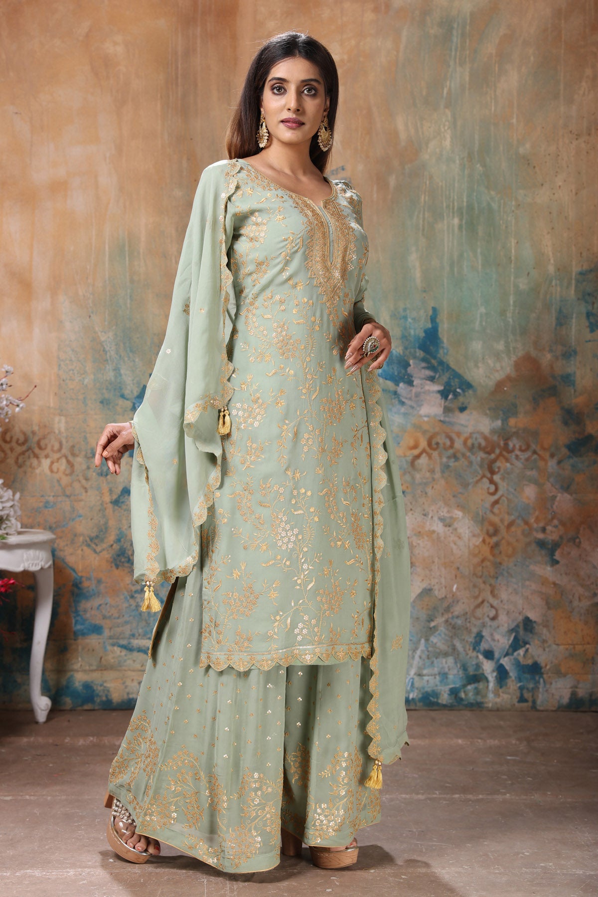 Shop beautiful mint green embroidered sharara suit online in USA with dupatta. Flaunt Indian style at parties and weddings in beautiful designer dresses, salwar suits, Anarkali suits, gowns, palazzo suits from Pure Elegance Indian fashion store in USA.-right