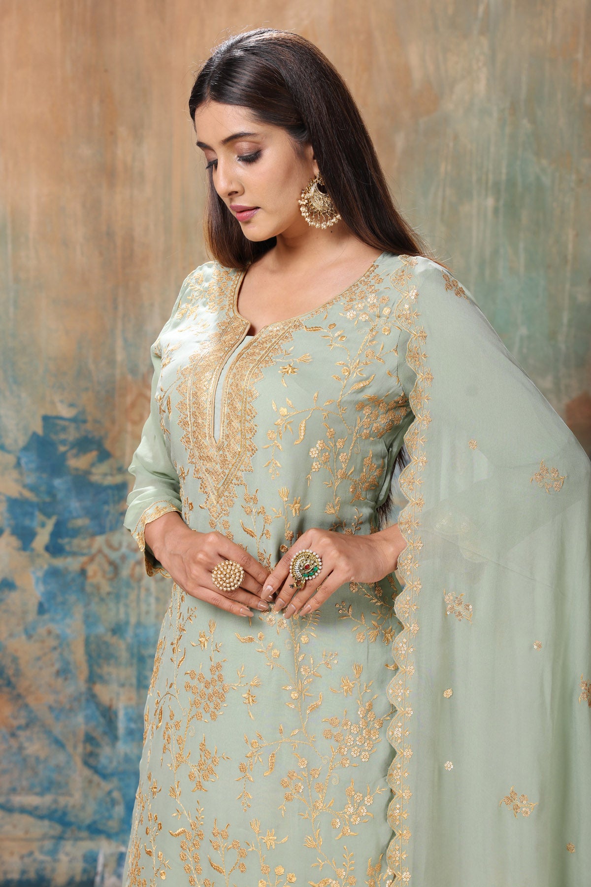 Shop beautiful mint green embroidered sharara suit online in USA with dupatta. Flaunt Indian style at parties and weddings in beautiful designer dresses, salwar suits, Anarkali suits, gowns, palazzo suits from Pure Elegance Indian fashion store in USA.-closeup
