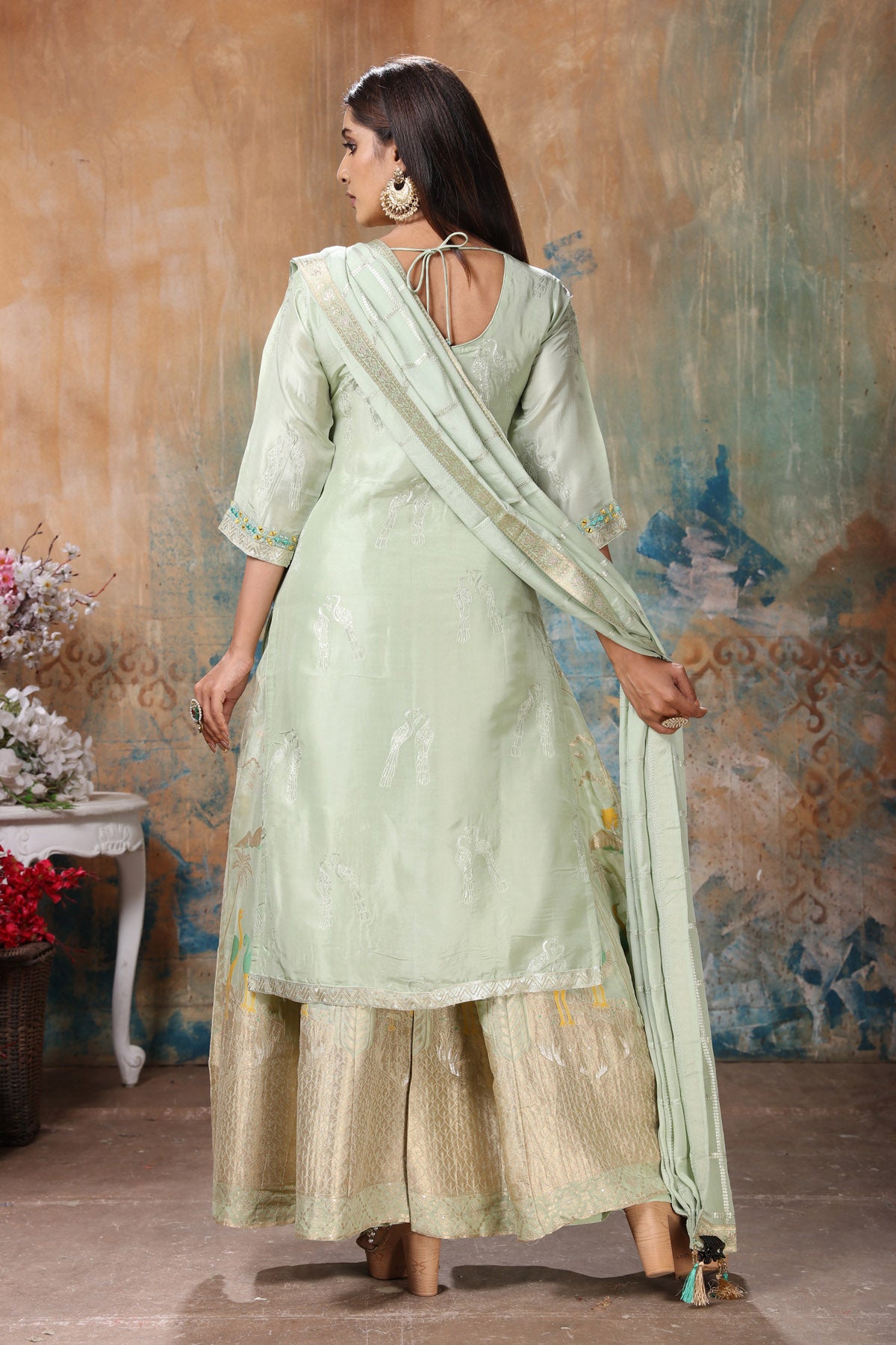 Shop beautiful mint green embroidered palazzo suit online in USA with dupatta. Flaunt Indian style at parties and weddings in beautiful designer dresses, salwar suits, Anarkali suits, gowns, palazzo suits from Pure Elegance Indian fashion store in USA.-back
