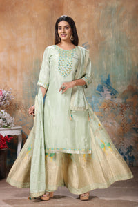 Shop beautiful mint green embroidered palazzo suit online in USA with dupatta. Flaunt Indian style at parties and weddings in beautiful designer dresses, salwar suits, Anarkali suits, gowns, palazzo suits from Pure Elegance Indian fashion store in USA.-full view
