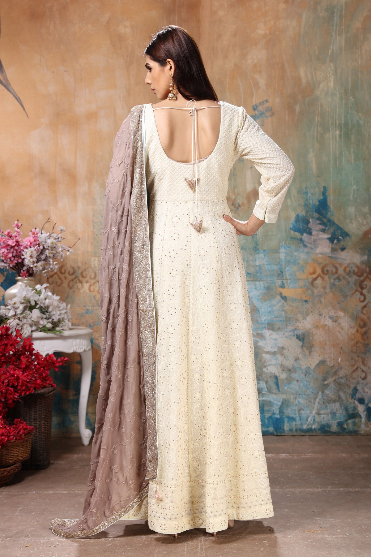 Buy gorgeous light yellow embroidered Anarkali suit online in USA with beige dupatta. Flaunt Indian style at parties and weddings in beautiful designer dresses, salwar suits, Anarkali suits, gowns, palazzo suits from Pure Elegance Indian fashion store in USA.-back
