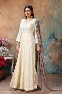 Buy gorgeous light yellow embroidered Anarkali suit online in USA with beige dupatta. Flaunt Indian style at parties and weddings in beautiful designer dresses, salwar suits, Anarkali suits, gowns, palazzo suits from Pure Elegance Indian fashion store in USA.-full view