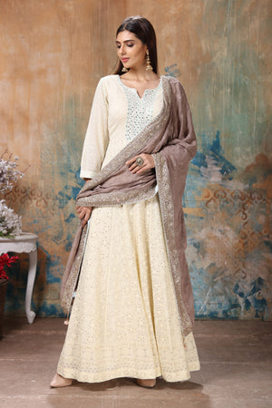 Buy gorgeous light yellow embroidered Anarkali suit online in USA with beige dupatta. Flaunt Indian style at parties and weddings in beautiful designer dresses, salwar suits, Anarkali suits, gowns, palazzo suits from Pure Elegance Indian fashion store in USA.-dupatta