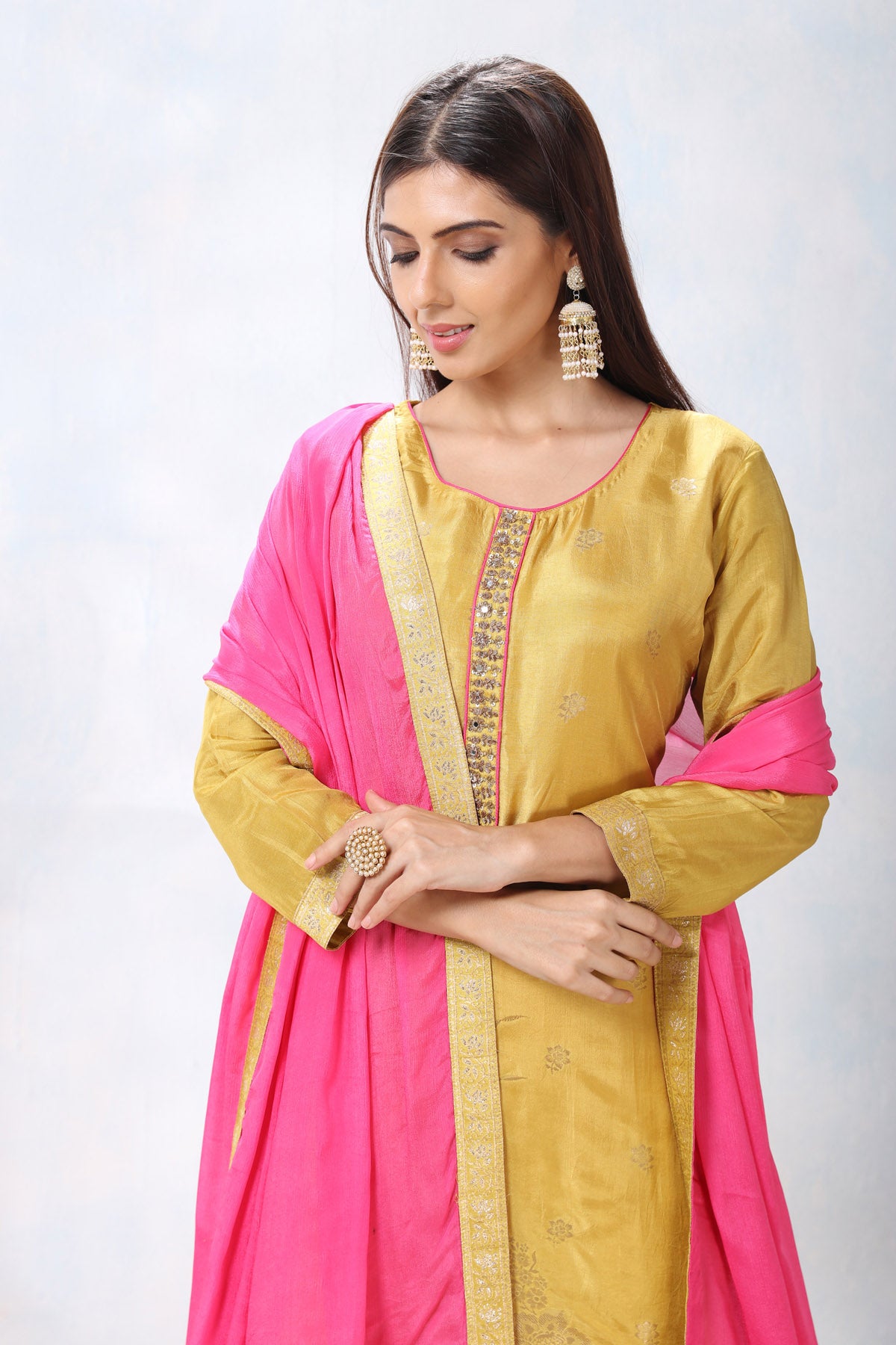 Buy gorgeous yellow embroidered sharara suit online in USA with pink dupatta. Flaunt Indian style at parties and weddings in beautiful designer dresses, salwar suits, Anarkali suits, gowns, palazzo suits from Pure Elegance Indian fashion store in USA.-closeup