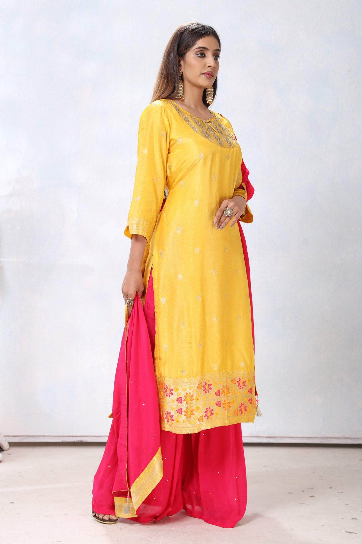 Shop beautiful yellow and pink embroidered crepe palazzo suit online in USA with dupatta. Flaunt Indian style at parties and weddings in beautiful designer dresses, salwar suits, Anarkali suits, gowns, palazzo suits from Pure Elegance Indian fashion store in USA.-right