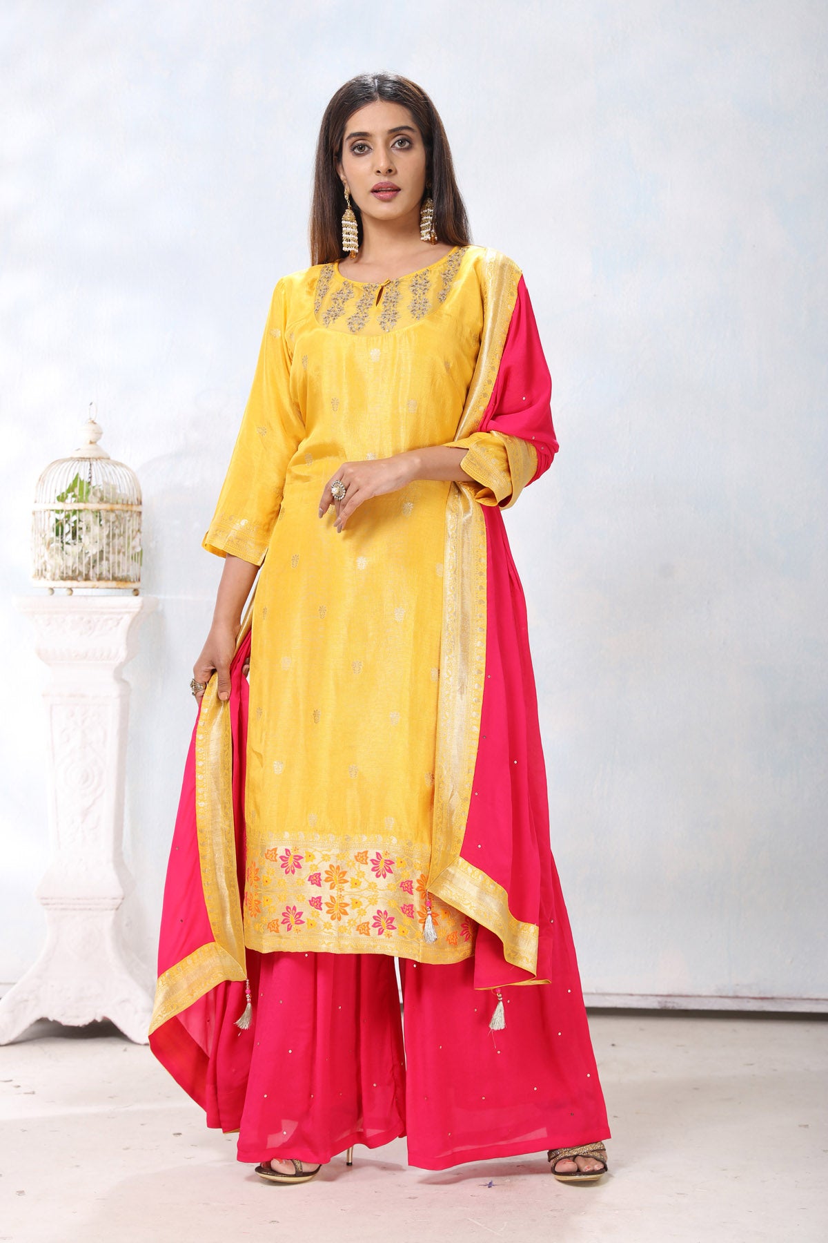 Shop beautiful yellow and pink embroidered crepe palazzo suit online in USA with dupatta. Flaunt Indian style at parties and weddings in beautiful designer dresses, salwar suits, Anarkali suits, gowns, palazzo suits from Pure Elegance Indian fashion store in USA.-full view